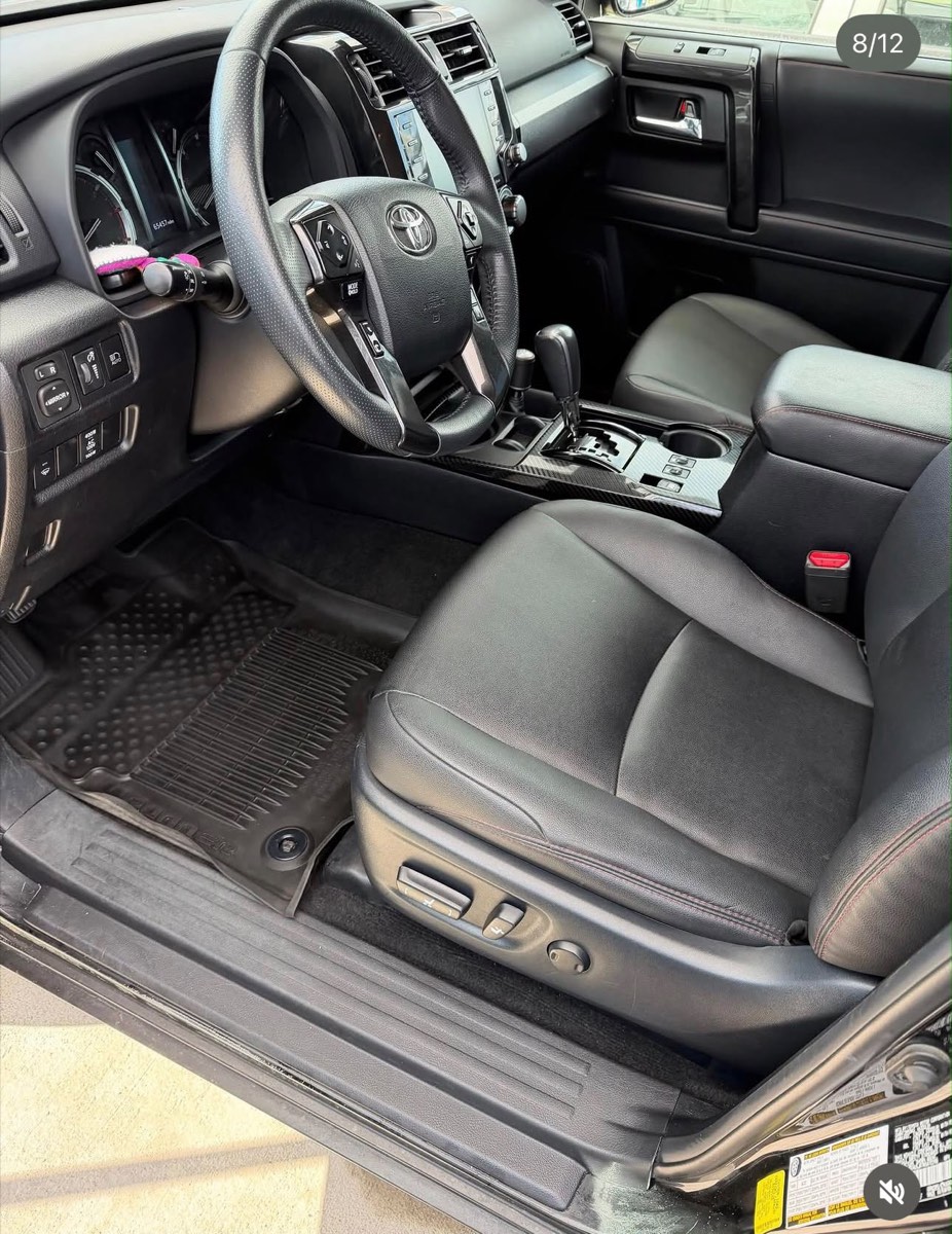 Toyota 4Runner interior after detailing — clean leather and floor mats